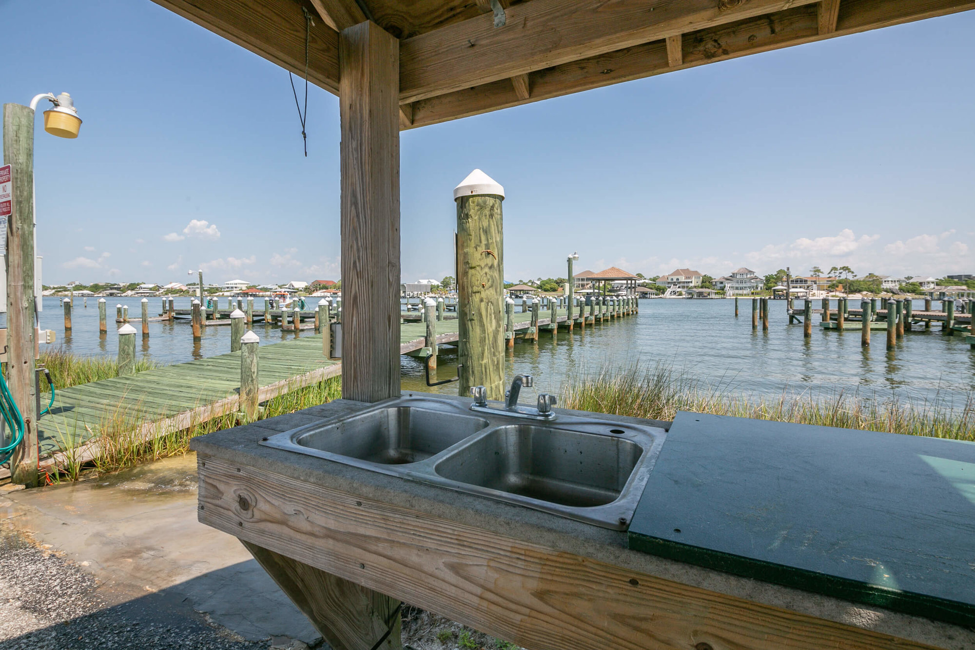 Perdido Key condos in Perdido Key covered fish cleaning station on Old River